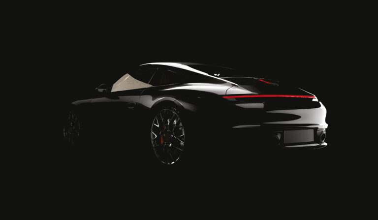 Black Porsche with Rave Gloss finish in shadow, showcasing premium Paint Protection Film for Cars